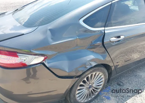 2015 Ford Fusion Titanium из США, поврежденный, VIN 3FA6P0K97FR273923